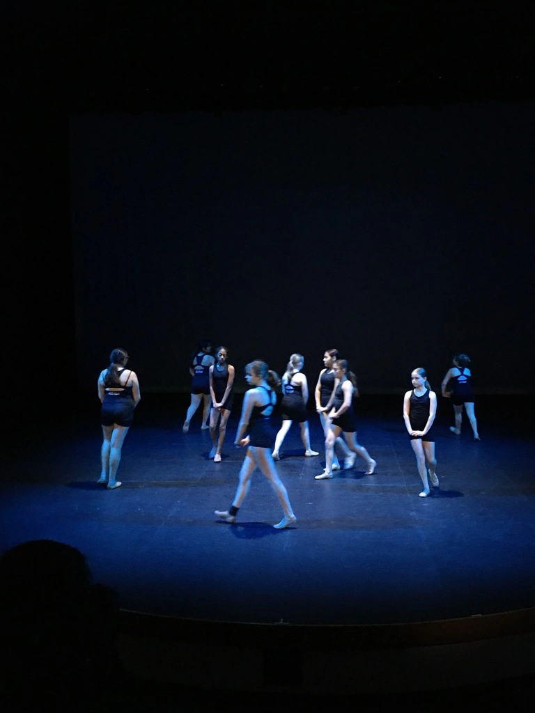 Company dancers in a moody contemporary concert piece
