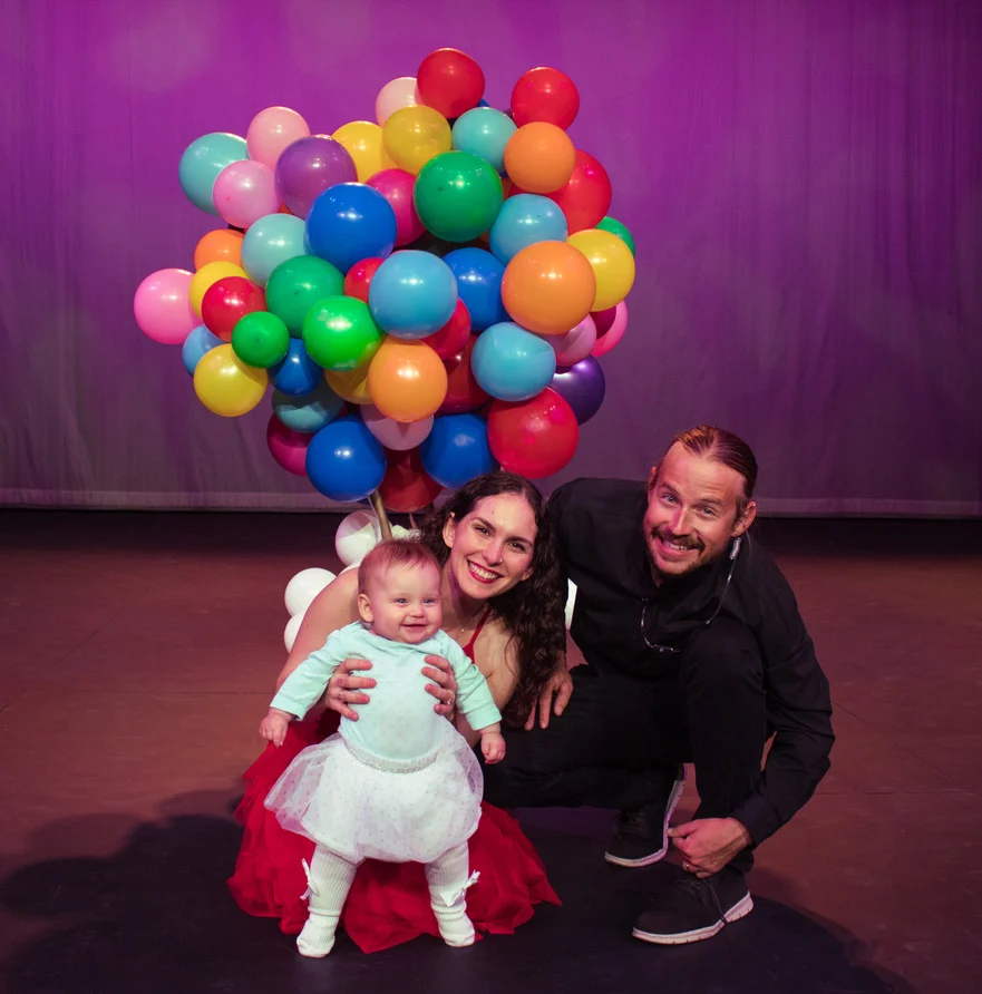 Seth and Mandy Saul with their daughter Mila on the Ovation Theatre stage